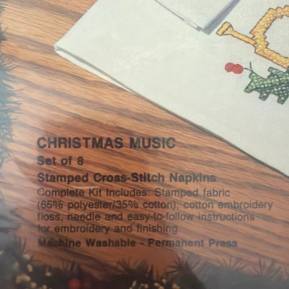 Bucilla Festive White Napkin Set with Gold and Green Design Stamped cross-stitch - Picture 3 of 4